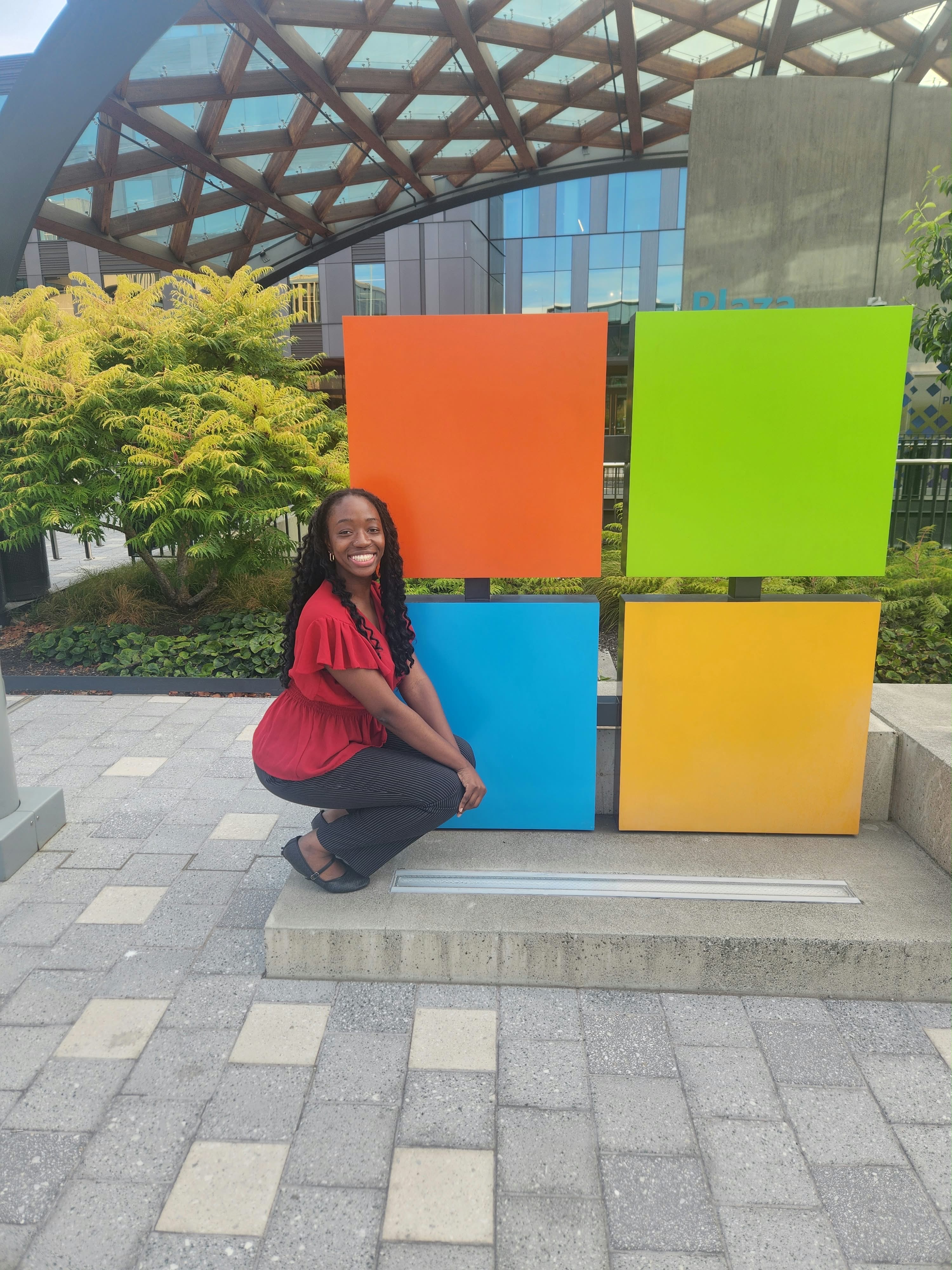 Naomi Enogieru smiling outdoors